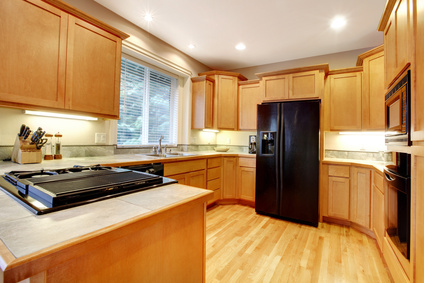 Kitchen With Open Floor Plan And Black Appliances Kitchen Cabinets